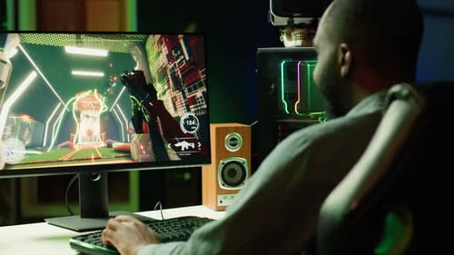 Man Using PC Having Immersive Experience While Gaming
