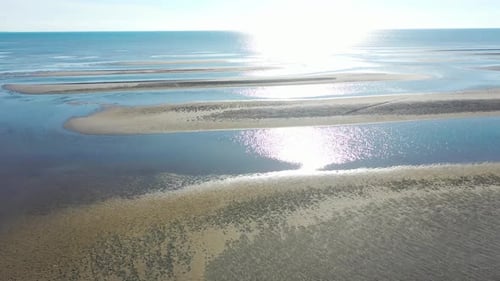 Beautiful Cape Cod Bay Aerial Drone Footage of Bay Side Beach at Low Tide with Sand Dunes Flying Tow