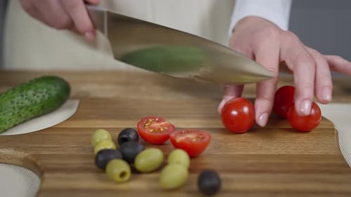Fresh Tomatoes Sliced on Cutting Board for Salad