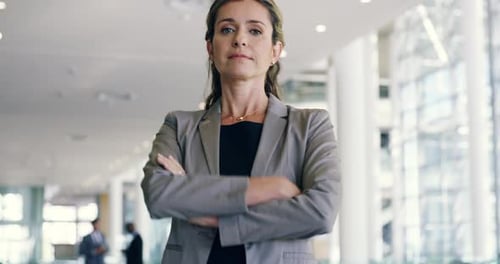 Corporate woman leader or CEO with arms crossed at office building for strong leadership
