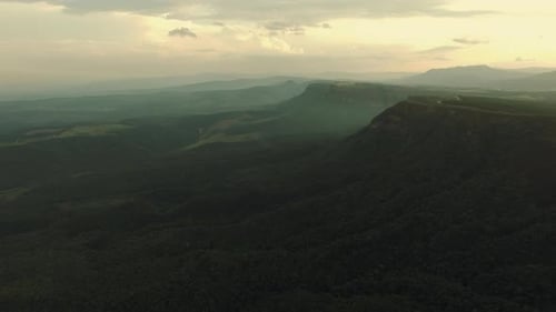 Arial Drone of Mountain Canyon/Mountain Range at Sunset