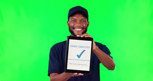 Happy black man, tablet and payment on green screen for order completed or successful transaction