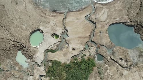 Top aerial view of rock pools in the Dead Sea