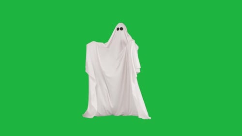 Halloween Ghost in White Sheet Posing Moving Hands at Camera Isolated on Chroma Key Green Screen