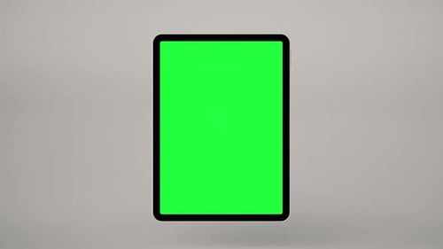 Tablet computer rotation animation with green screen