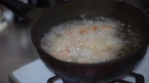Food Cooking in Wok Deep Fried