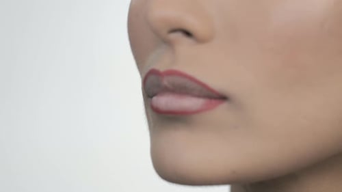 Close up of Woman's Lips with Red Liner