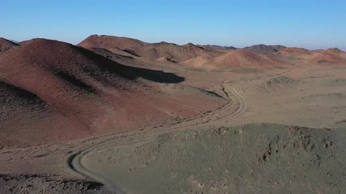 Cinematic drone shot of a road in the Charyn Canyon, Kazakhstan