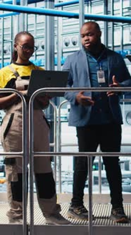Vertical Video Industry 40 Photovoltaics Plant Manager Overseeing Work Done By Employees
