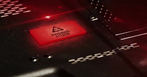 Digital Phishing Attack Warning on Circuit Board with Red Light