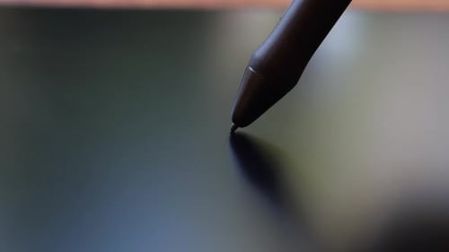 Stylus Interacting With a Touchscreen Device in Close-up