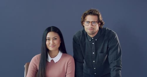 4k video footage of two young architects working together in a modern office