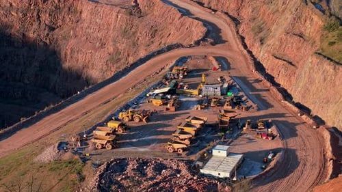 Aerial view of surface mining operation with heavy equipment