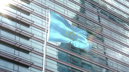 Realistic Waving Flag with Emblem in Front of Corporate Building