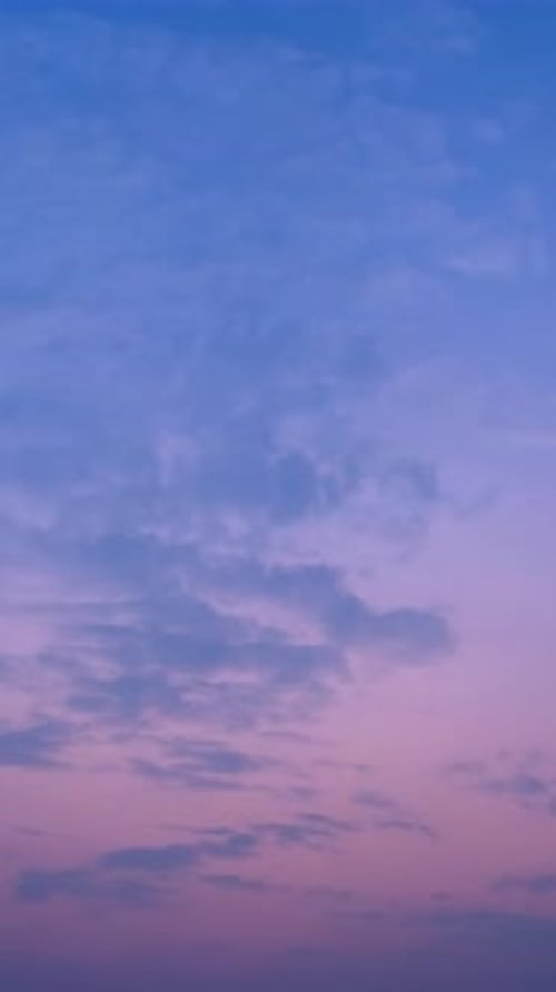 Clouds Drifting Gently Across the Colorful Evening Sky