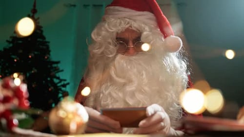 Santa Claus Is Reading The First Christmas Letters From His Office
