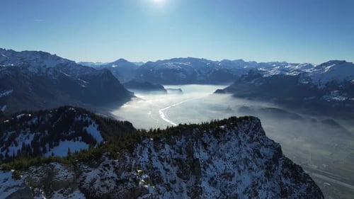 Aerial shot flying sideways and up with a stunning view over the rhein valley during a sunny autumn