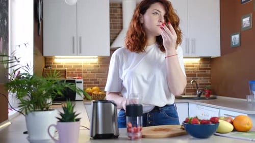 Woman Prepares Healthy Snack in Bright Kitchen