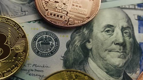 Golden Bitcoin Coins and Hundred Dollar Banknotes