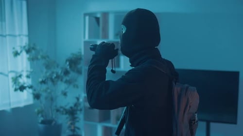 Intruder in Ski Mask Searches Dark Home