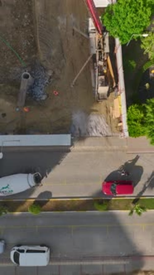 Construction Site Aerial View with Concrete Mixer Truck