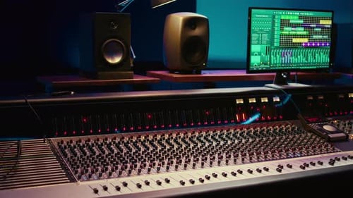 Empty Professional Studio with Control Desk Mixer and Audio Recording Software