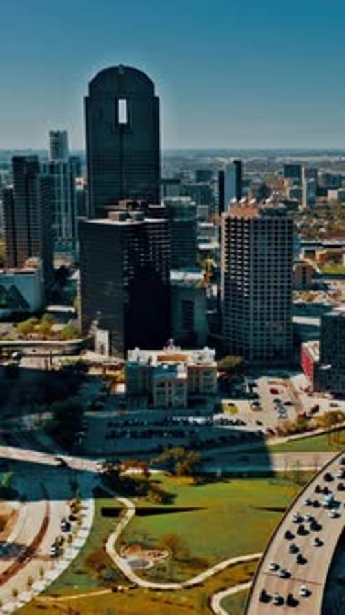 Aerial view of Dallas skyline showcasing urban development and green spaces