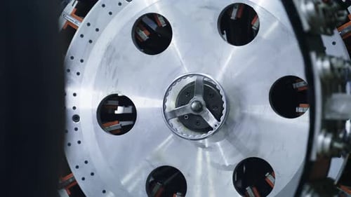 Tire Production Machine Rotating at Industrial Robotic Workshop Producing. Technological Rubber Tyre