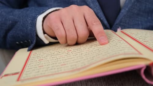 Businessman Reading Quran