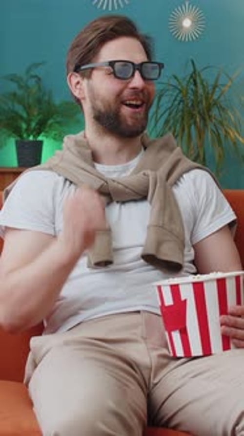 Man in 3D Glasses Watches Movie
