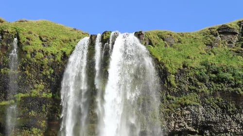 Icelandic waterfall, famous tourist attraction, Seljalandsfoss in south Iceland