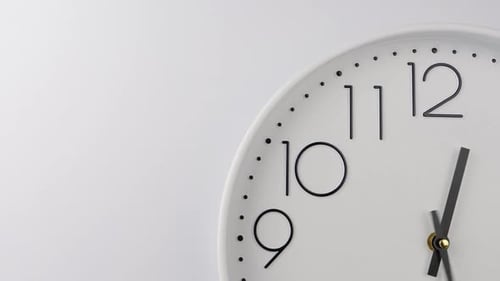 Minimalist Clock Face with Focus on Numbers 10, 11, and 12