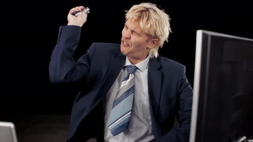 Frustrated Man In Suit Throws Pens Into The Air