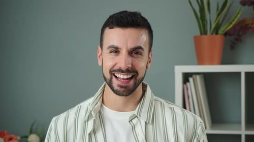 Close Up Portrait of One Handsome Guy with Perfect White Teeth Smiling at Home Front View of Young
