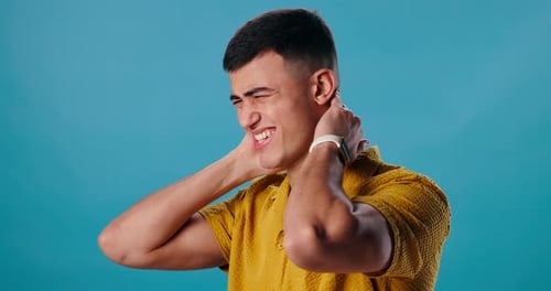 Man Experiences Intense Neck Pain