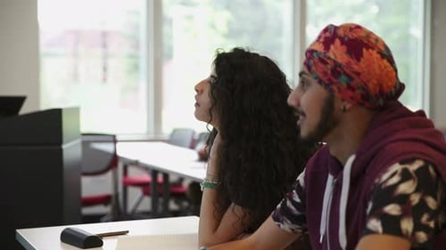 Students Listening in University Seminar 20s