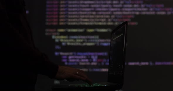 Hacker Writing Code Cracking Computer Programming Code in the ...