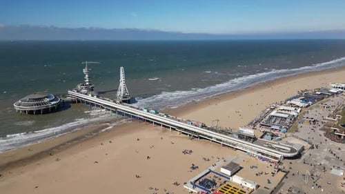 Aerial shot of the pier on Scheveningen beach in The Hague city in Netherlands