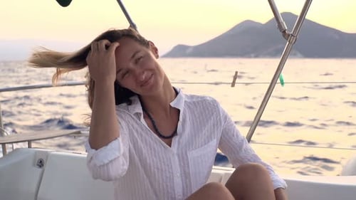 Portrait of Happy Woman Sailing Boat on Sea Adult