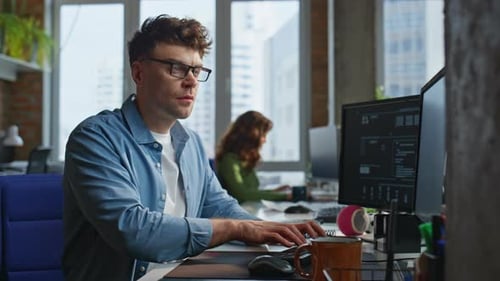 Focused Man Looking Desktop at Open Space Closeup Freelancer Working Computer