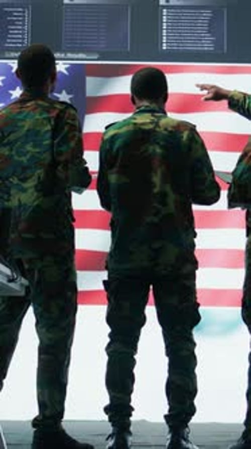 Vertical Video US Soldiers in a High Tech Command Center Protecting Classified Information