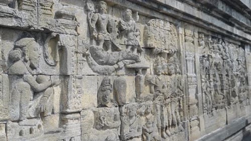 Detailed wall ornamented works and history of the famous Borobudur temple Yogyakarta Java Indonesia