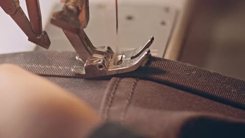 Sewing Machine Stitching Dark Brown Fabric Close Up