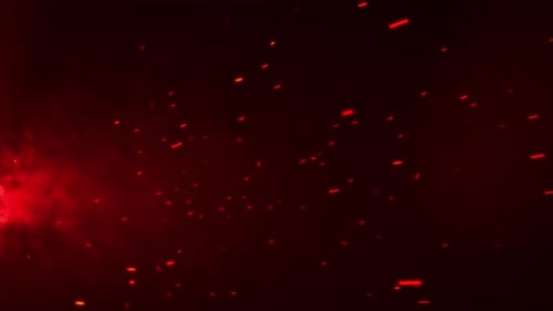 Burning red hot sparks rise from large fire seamless loop