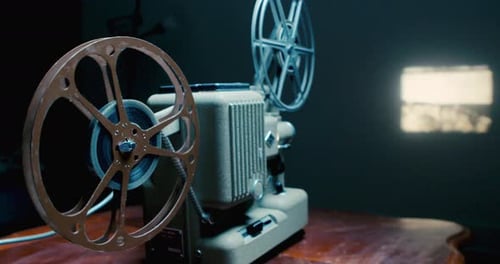 Vintage Movie Projector on Table With Cinematic Dramatic Lighting
