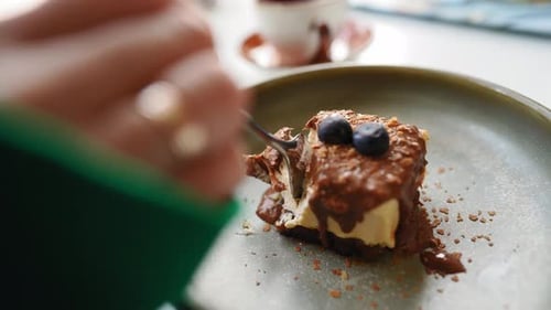 Chocolate Cake Dessert Being Eaten with Spoon