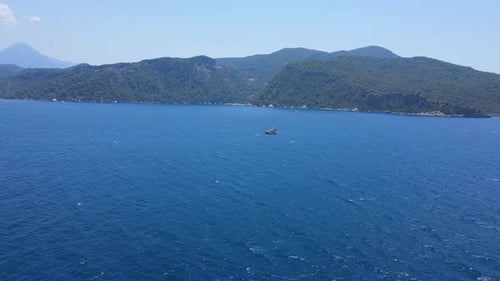 Beautiful view of the beach with boats, pure nature, sea and ships. Shot from a drone.