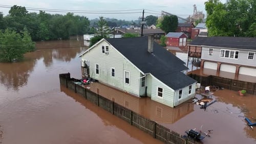 Abandoned flood house in American neighborhood. Aerial view. Hurricane Harvey destroying city. Dirty