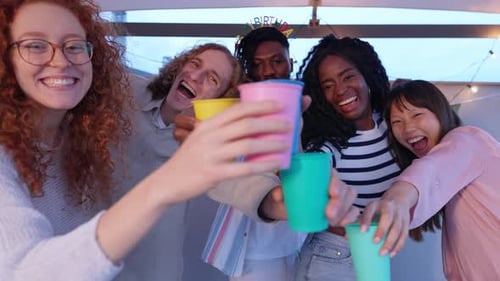 Friends Celebrate Birthday Together on Urban Rooftop