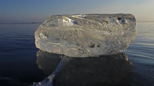Piece of Ice on Lake Baikal at Sunset